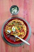 Potato and mushroom tortilla with red peppers