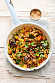 Asian vegetable stir fry with lupine fillets and sesame seeds