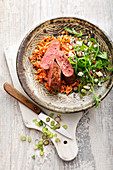 Greek lamb with tomato rice and feta