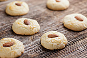 Almond cookies on a wooden background