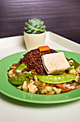 Chinese vegetables with red rice and tofu with bean sprouts