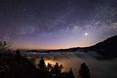 Milky Way and Venus over clouds in China