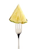 Pineapple slice on a fork
