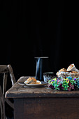 Wholemeal muffins on a wooden table with autumnal decoration
