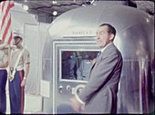Apollo 11 astronauts in quarantine greeted by Nixon, 1969