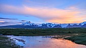 Mountain range at sunset, time-lapse footage