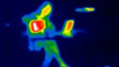 Person pouring hot drink thermographic