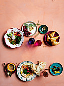 Prawn borek, chickpea salad with tahini dressing, beetroot kebabs, eggplant and walnut dip, olives, pickles