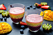 Blueberry, mango, strawberry, kiwi and banana greek yogurt smoothie