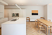 White kitchen with dining area