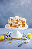 Lemon cake with sponge, lemon curd and italian meringue