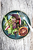 Colourful salad with potato fritters