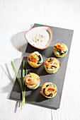 Spinach muffins with smoked salmon and a cheese dip
