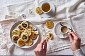 Tea with flower biscuits