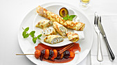 Hungarian pancakes with a fruit skewer