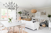 Scandinavian-style living-dining room in natural shades
