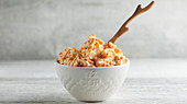 Pimento and cheese dip in a small bowl
