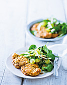 Almond-crumbed pork and summer salad