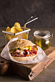 Delicious pastrami sandwich with pickles, mustard and mayo