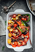 Stuffed paprika with tomatoes, garlic and olives