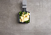 A kale and apple raclette pan