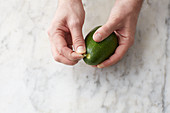 Testing the ripeness of avocado
