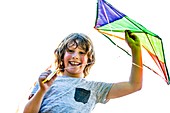 Boy holding kite