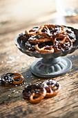 Mini pretzels with chocolate glaze and sugar nibs