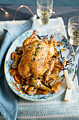 Roast duck with artichokes and dried citrus fruit