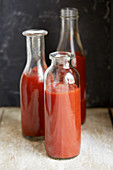 Tomato juice in vintage bottles