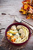 Soup with chicken meatballs and pasta
