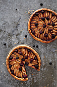 Two apple and blackberry tarts