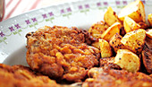 Viennese escalope with fried potatoes