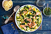 Potatoe, courgette and salmon bake with herbs