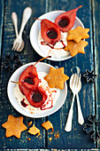 Pears cooked in wine, mascarpone cream and gingerbread stars