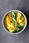 Coconut dhal with cauliflower and almond sprinkles