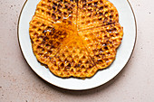 Sweet potato and cinnamon waffles with maple syrup