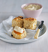 Date scones with apricot jam and brown sugar cream