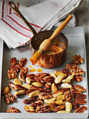 Honey glazing nuts for topping cakes