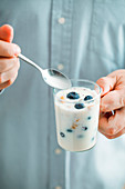 Healthy breakfast yogurt with fruit and seeds