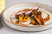 Beef fillet with grilled mandarins and chicory
