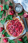 Apple pie with roses, frangipane filling and yeast dough