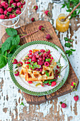 Thick waffles with berries and honey