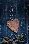 Heart shaped Christmas ginger biscuits with decorative string