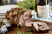 Pork roulade with a peanut and herb filling