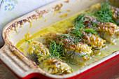 Gratinated Baltic herring with curry, dill and lemon