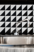 DIY, black-and-white splashback behind sink