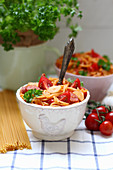 Spaghetti with tomatoes, sausage and garlic