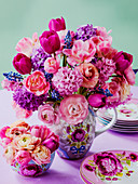 Bouquet of pink spring flowers with tulips, hyacinths and ranunculus