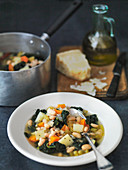Italian Cavalo Nero Bean and vegetable soup, served with pamesan cheese